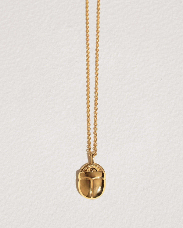 large scarab necklace with 14k yellow gold plate over brass