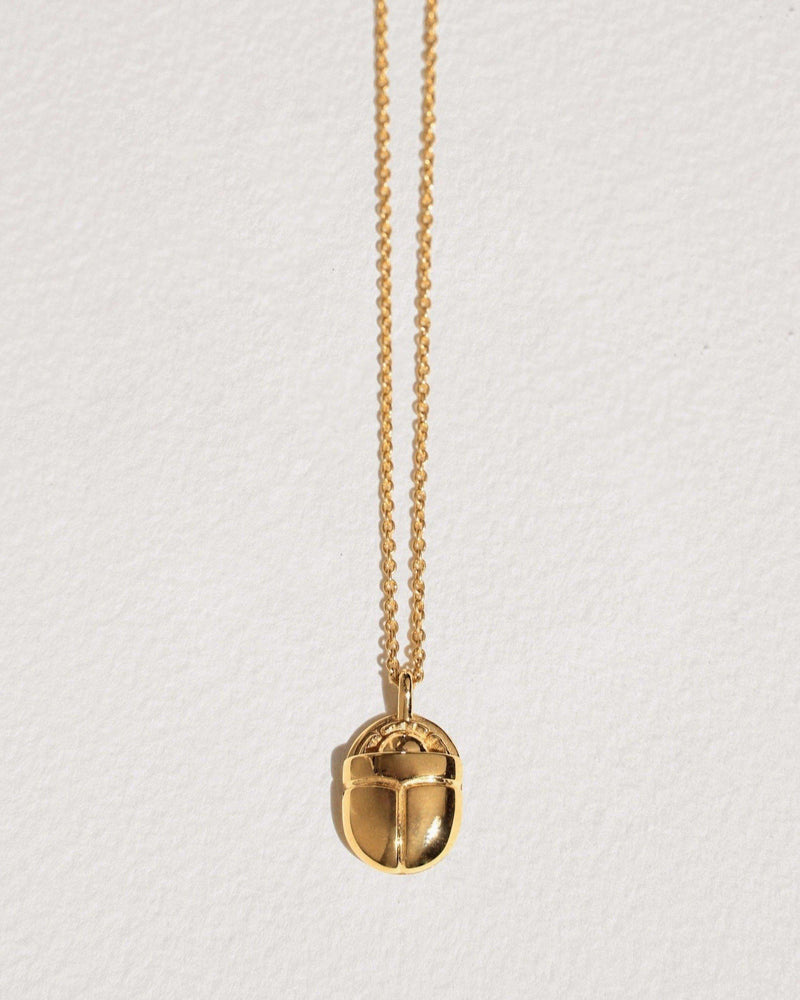 large scarab necklace with 14k yellow gold plate over brass